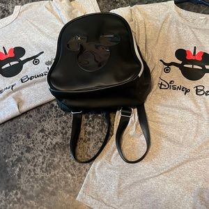 2 brand new, medium Disney bound tshirts and brand new pin collector backpack